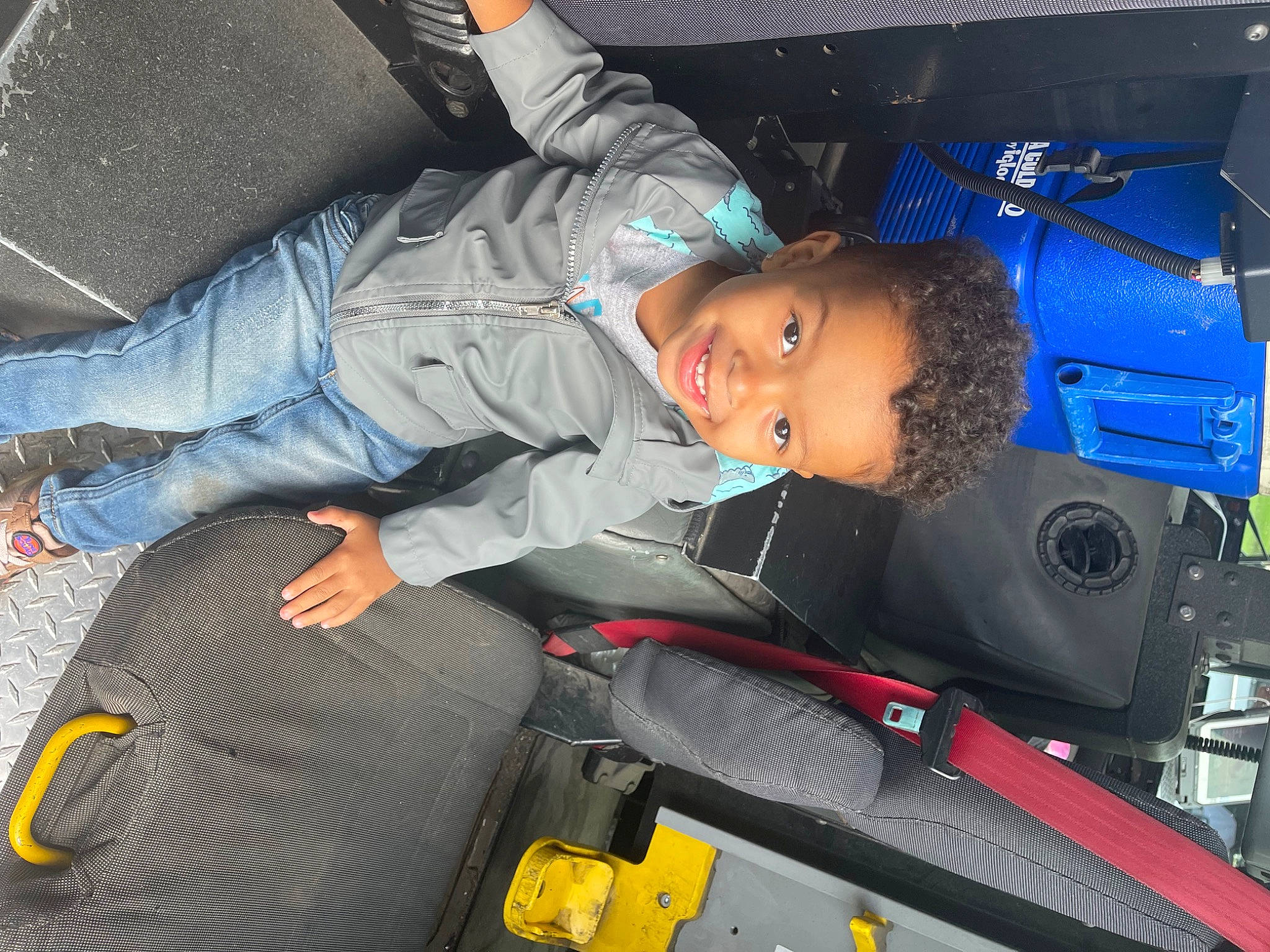 Delvonte Jr joined the competition — help win amazing prizes! auto_part, automotive_design, automotive_exterior, automotive_tire, automotive_wheel_system, bag, bumper, car_seat, comfort, electric_blue, family_car, fun, joy, luxury_vehicle, motor_vehicle, person, product, smile, toddler, travel