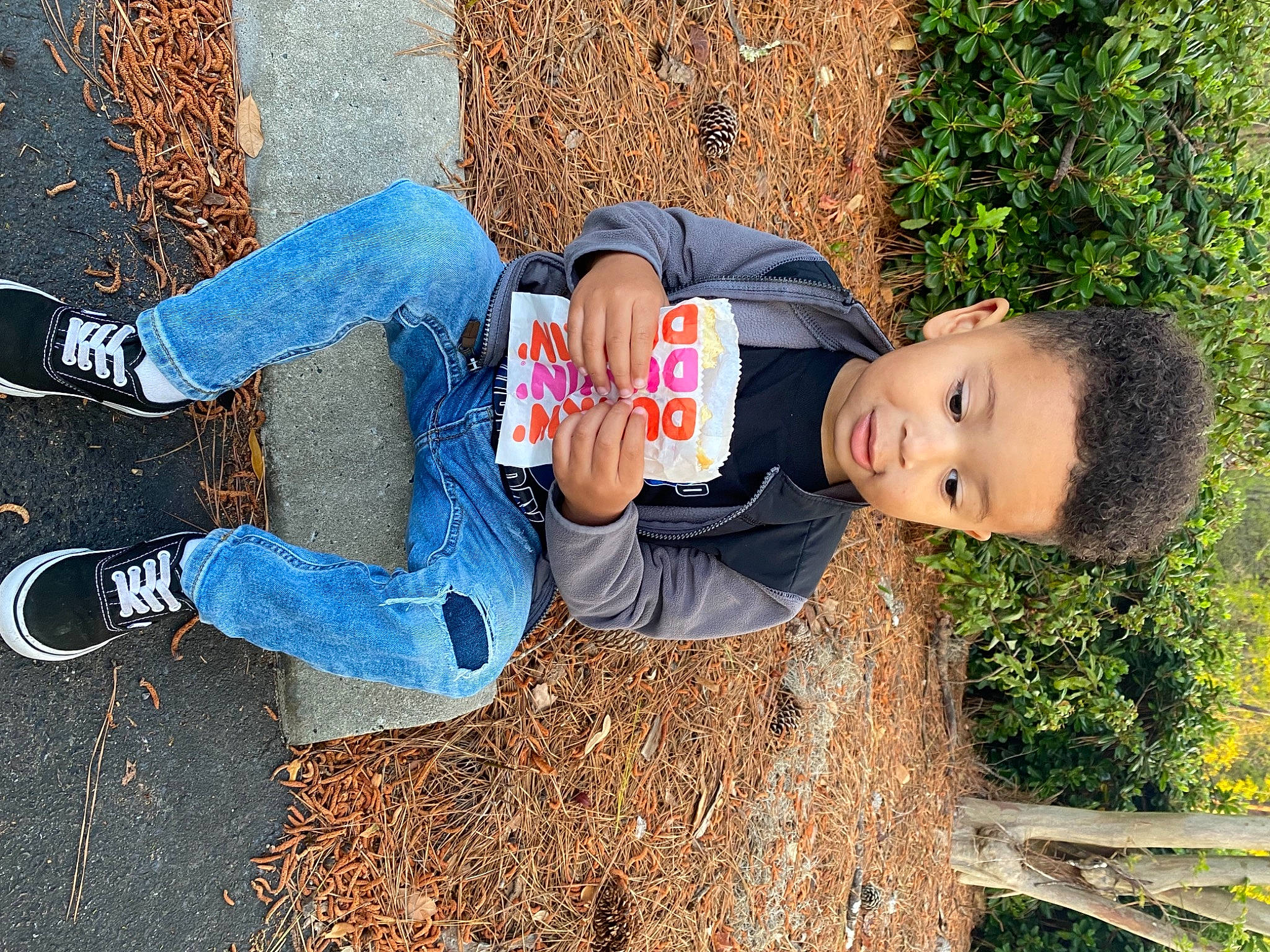 Ashton is registered to the contest to win money with this photo: child, clothing, cool, denim, electric_blue, footwear, fun, grass, happy, hat, human_leg, jeans, leisure, people_in_nature, person, plant, shoe, sneakers, toddler, tree