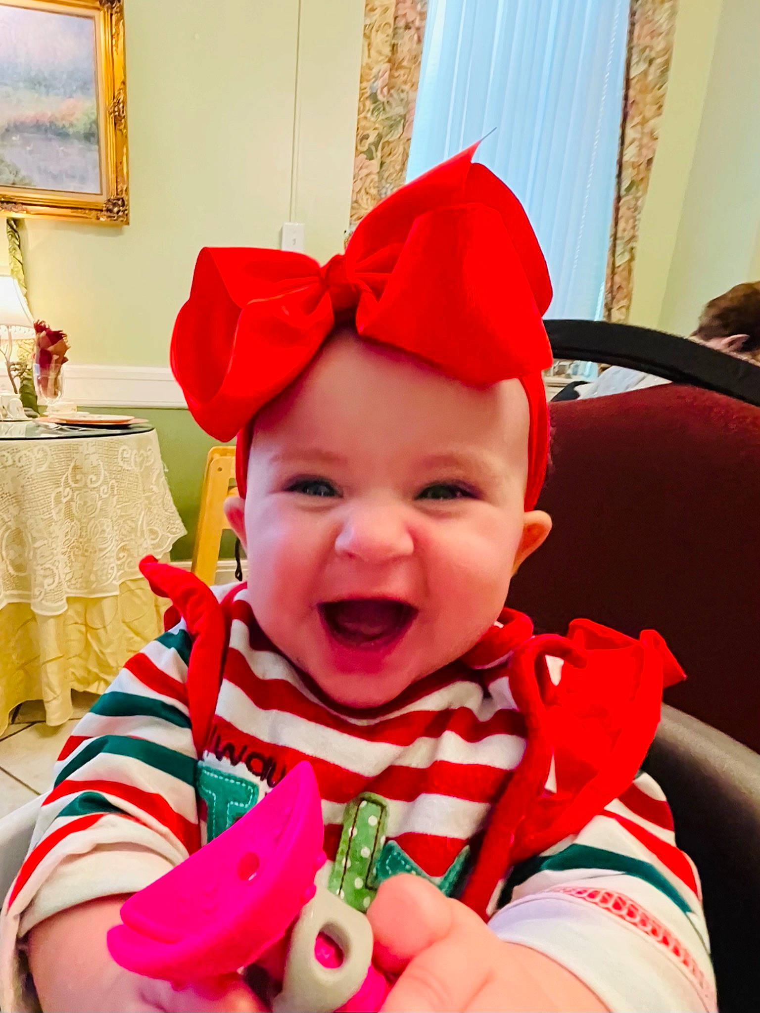 Catherine joined the competition — help win amazing prizes! baby, baby_toddler_clothing, birthday, carmine, chair, child, costume_hat, event, fictional_character, fun, happy, hat, headwear, holiday, human_body, party_supply, person, picture_frame, pink, red