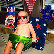 Holden is registered to the contest to win money with this photo: baby, child, watermelon, sunglasses, patriotic, usa, red_white_blue, stars, blanket, summer, outdoor, holiday, celebration, cute, funny, toddler, decorations, relaxing, seat, diaper