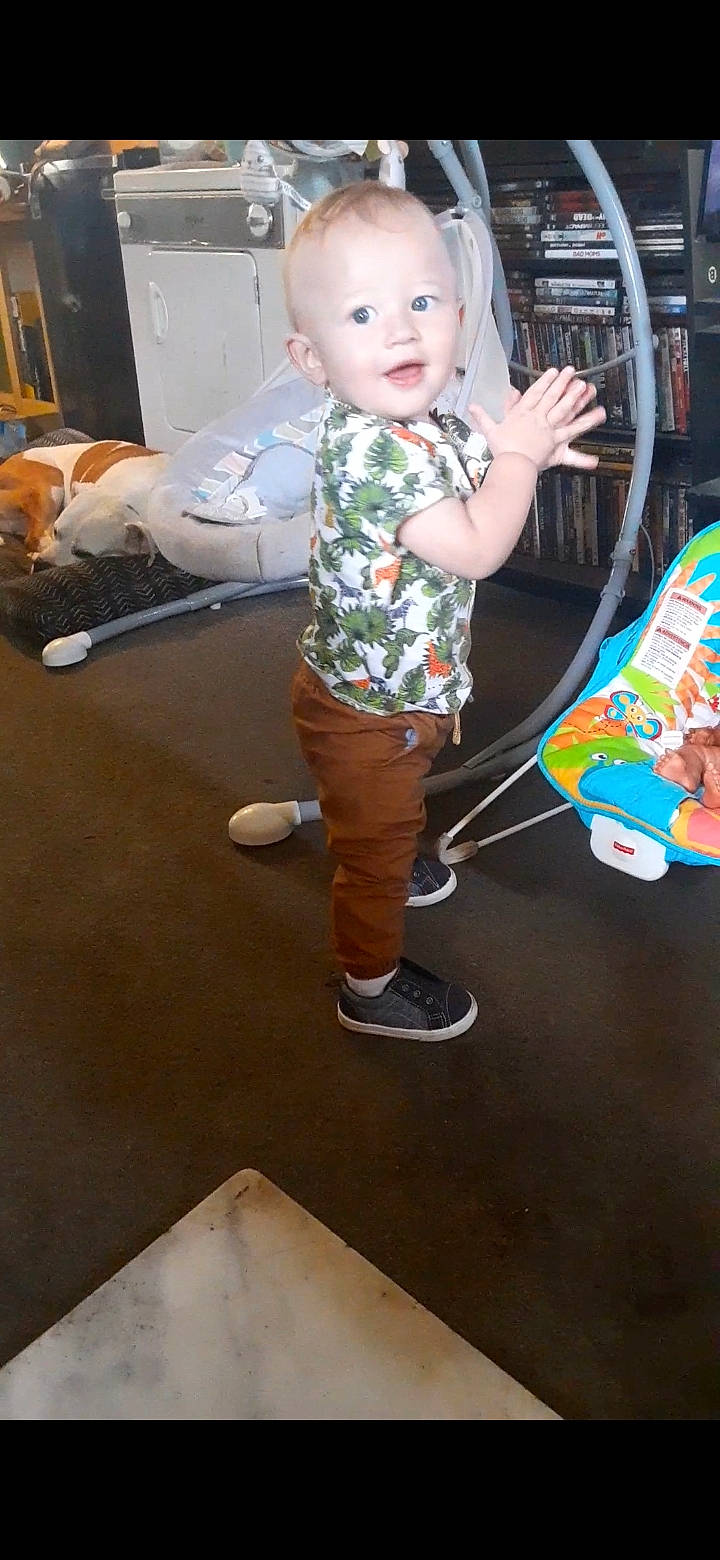 Nikolai joined the competition — help win amazing prizes! baby, baby_toddler_clothing, child, flooring, fun, hairstyle, happy, human_leg, knee, mammal, person, play, sandal, shorts, sitting, smile, standing, t_shirt, toddler, toy