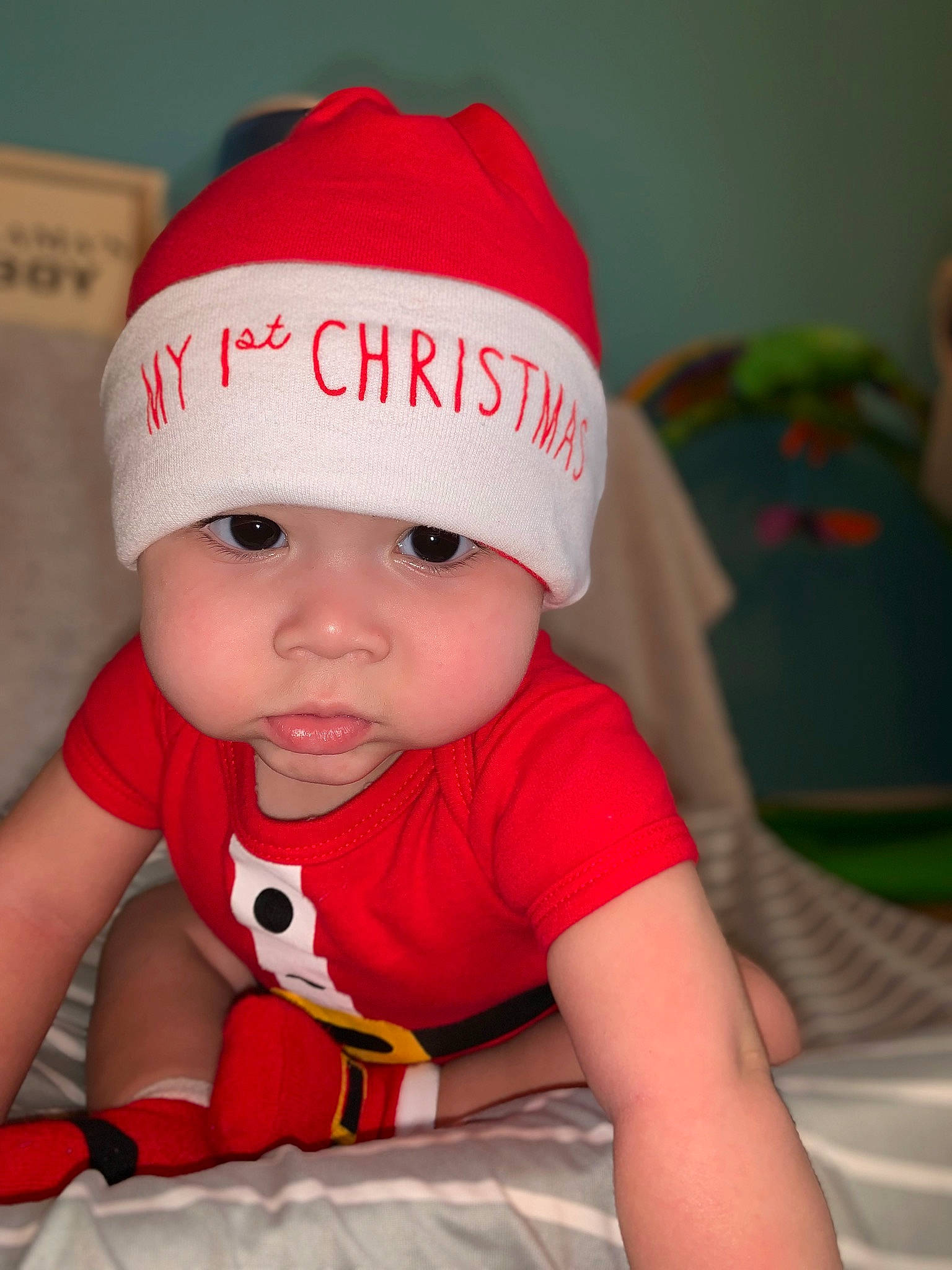 Emmanuel is registered to the contest to win money with this photo: baby, baby_toddler_clothing, beanie, cap, cheek, child, chin, cool, costume_hat, fashion_accessory, happy, headgear, headwear, knit_cap, magenta, pattern, person, pink, sleeve, t_shirt