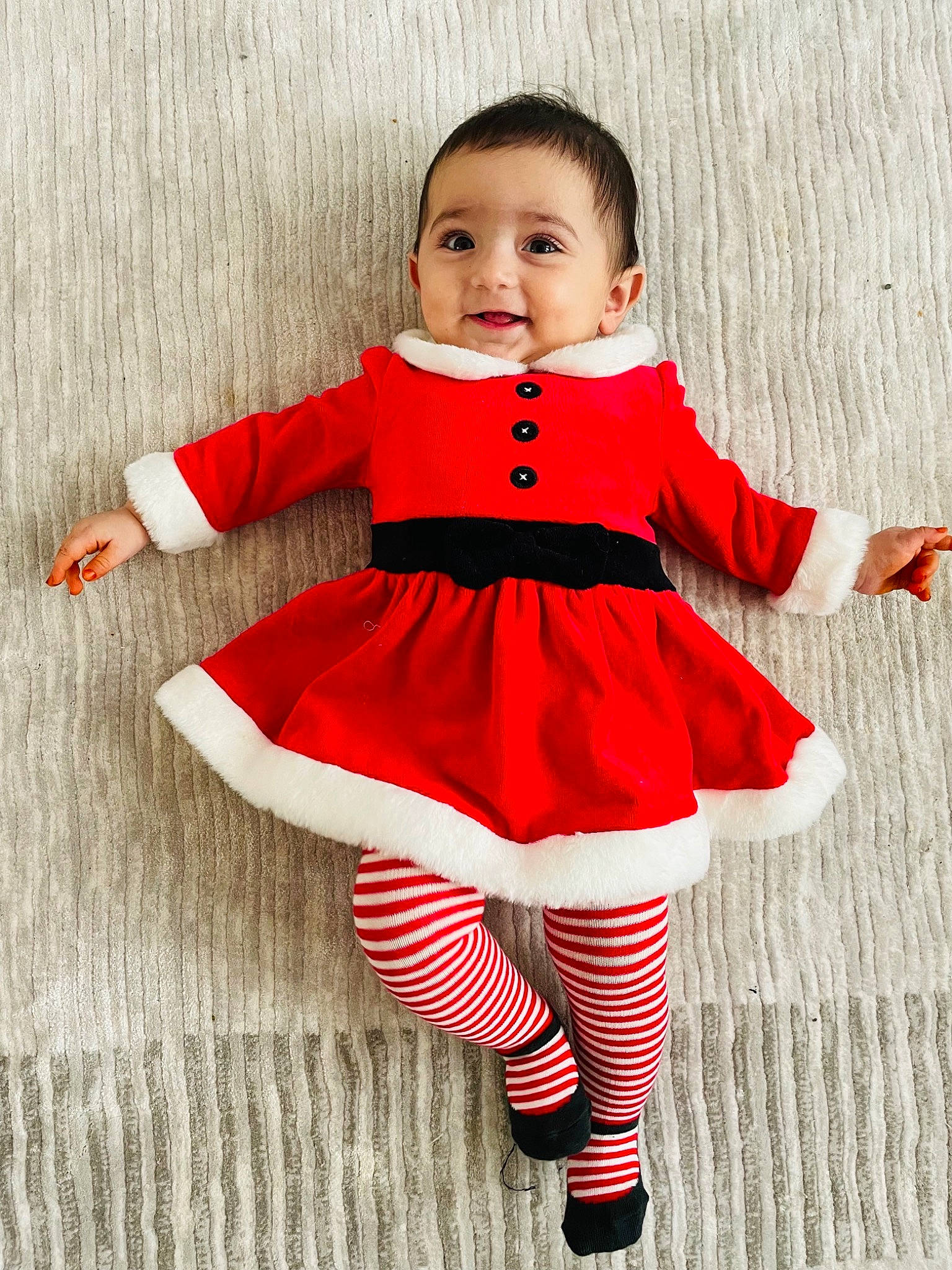 Alya participe au concours pour gagner de l'argent avec cette photo : arm, baby_toddler_clothing, beauty, clothing, event, happy, human_leg, knee, leg, magenta, one_piece_garment, pattern, person, pink, shoe, sleeve, smile, sock, standing, thigh