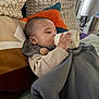 Angel joined the competition — help win amazing prizes! baby, bottle, blanket, couch, pillow, sleeping, indoor, child, feeding, soft_texture, cozy, person, milk, resting, covered, infant, homedecor, relaxing, cute, peaceful