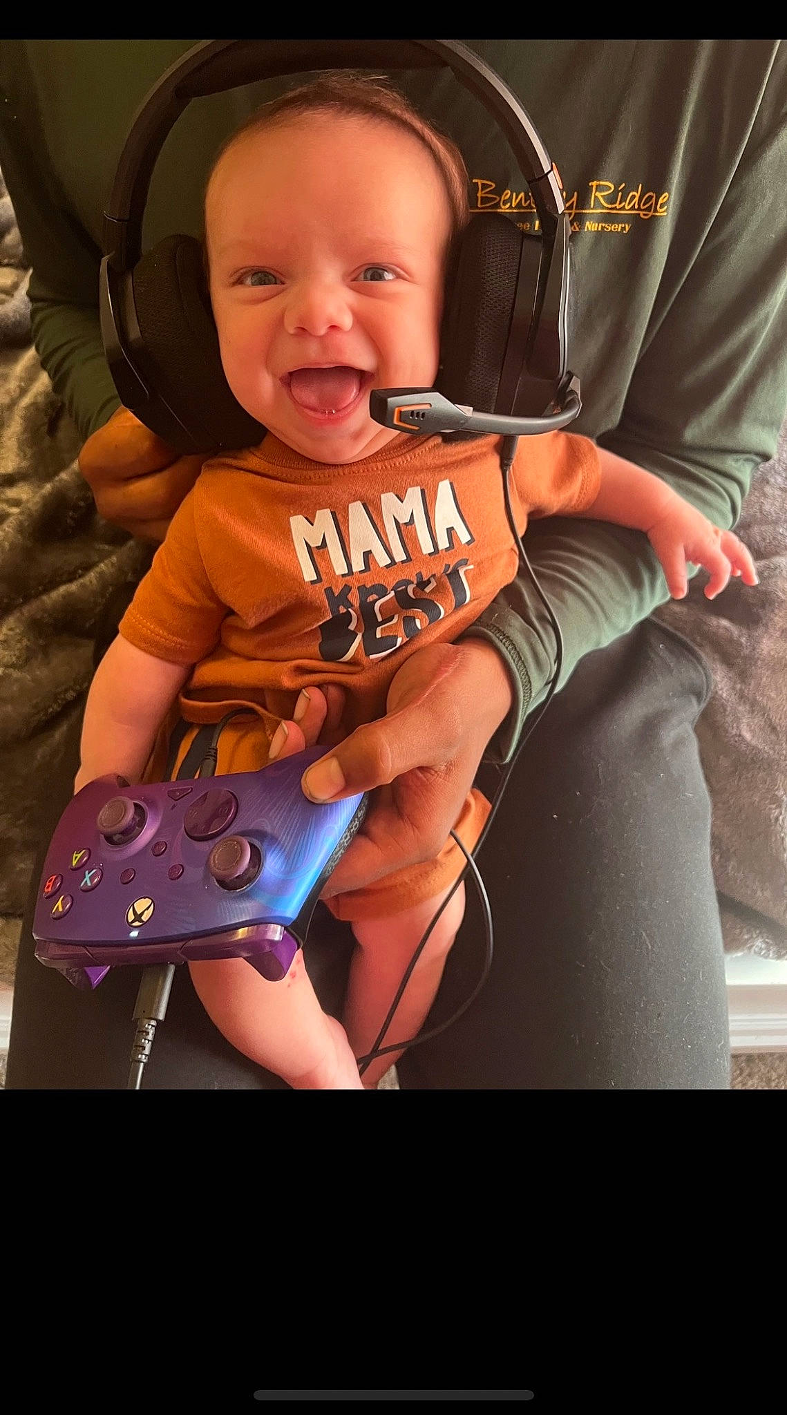 Jalen is registered to the contest to win money with this photo: baby, baby_toddler_clothing, child, cool, electric_blue, fashion_accessory, finger, fun, gadget, gesture, happy, nail, person, personal_protective_equipment, photograph, sleeve, smile, snapshot, t_shirt, thumb