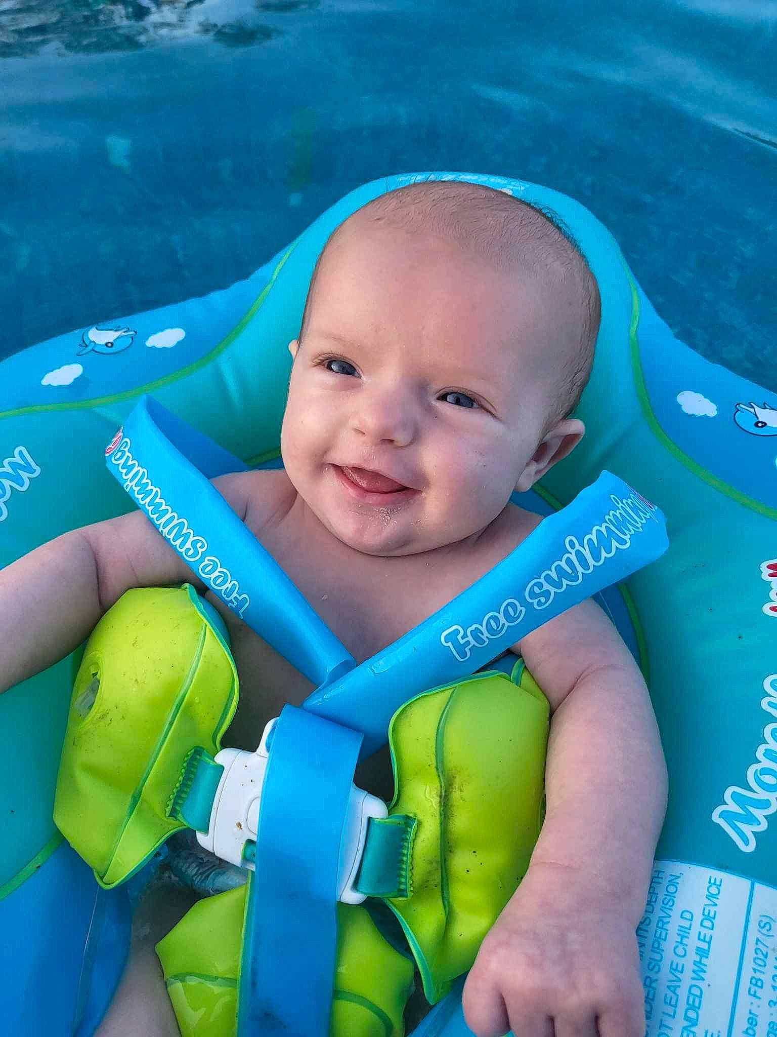 Jadyn is registered to the contest to win money with this photo: aqua, azure, baby, baby_products, baby_toddler_clothing, blue, child, electric_blue, fun, happy, joy, leisure, lifejacket, people_in_nature, person, personal_protective_equipment, recreation, smile, summer, toddler