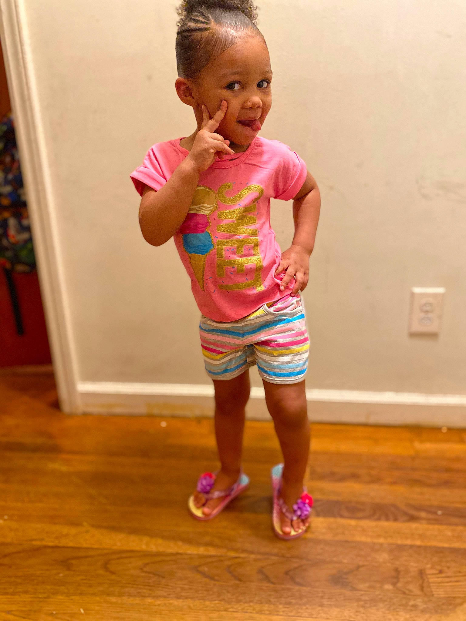 Auzhane is registered to the contest to win money with this photo: baby_toddler_clothing, beauty, cheek, face, floor, flooring, happy, hardwood, head, laminate_flooring, person, shorts, skin, sleeve, smile, standing, thigh, thumb, toddler, varnish