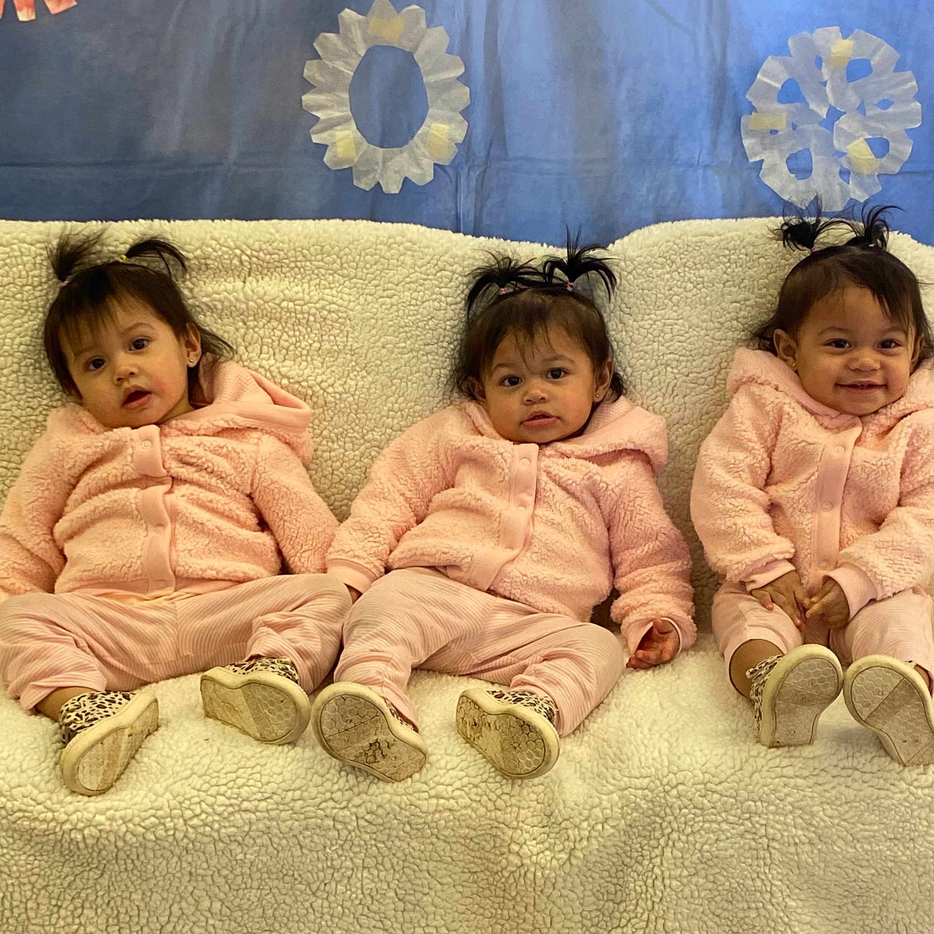 Wendy is registered to the contest to win money with this photo: baby, blanket, brownhair, clothing, couch, face, family, footwear, furniture, hair, happy, head, people, person, racket, shoe, sport, tennis, tennisracket