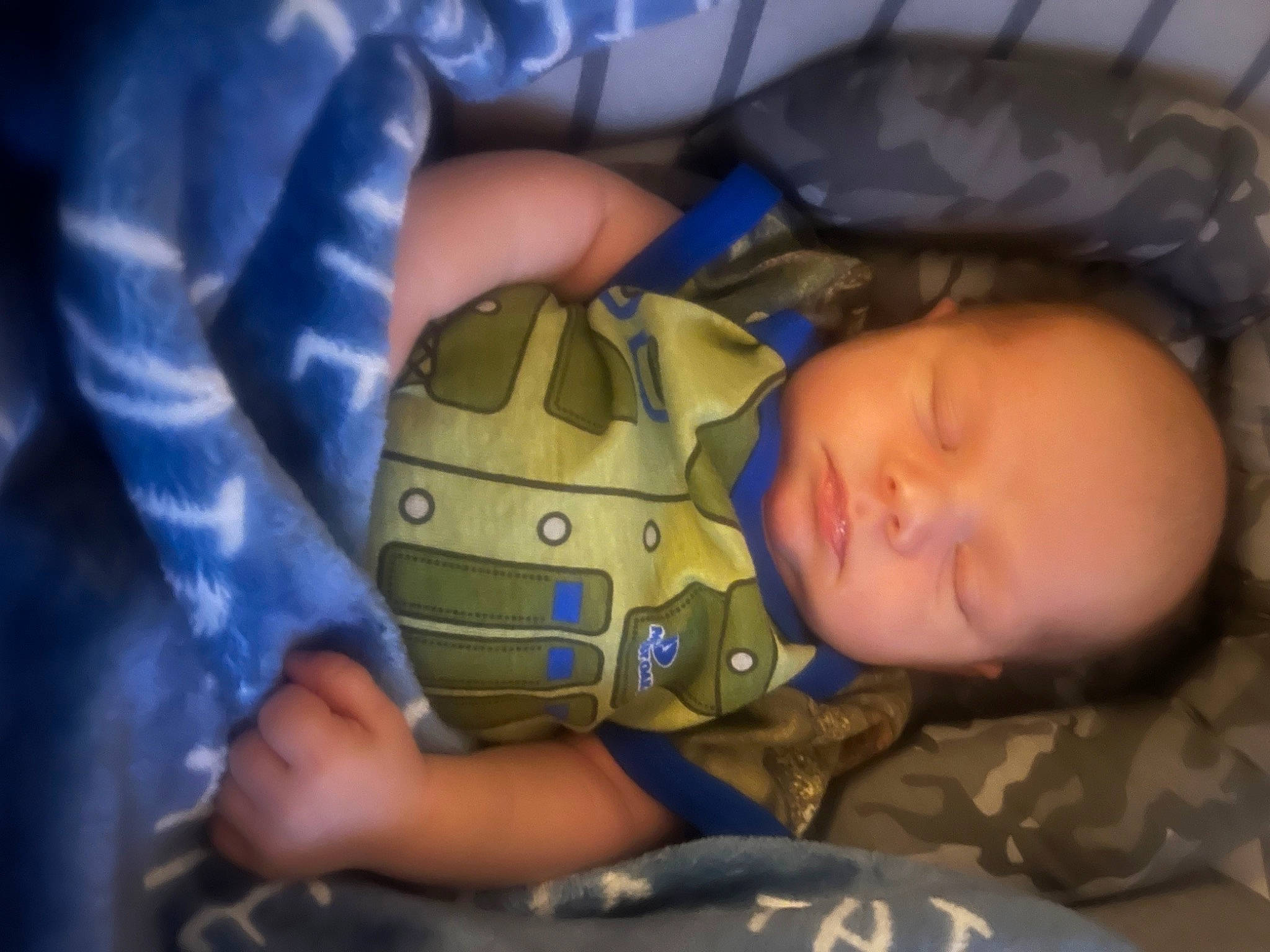 Tate joined the competition — help win amazing prizes! baby, baby_products, baby_toddler_clothing, bedtime, cheek, child, comfort, electric_blue, finger, gesture, hand, mouth, nap, person, room, sitting, skin, sleep, sleeve, thumb