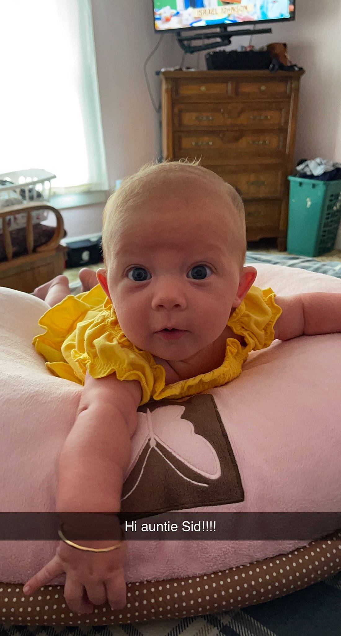 Heidi Brooke Turner is registered to the contest to win money with this photo: baby, baby_products, baby_safety, baby_toddler_clothing, cabinetry, cheek, chest_of_drawers, child, comfort, drawer, dresser, flooring, fun, happy, linens, person, room, sitting, skin, surprise