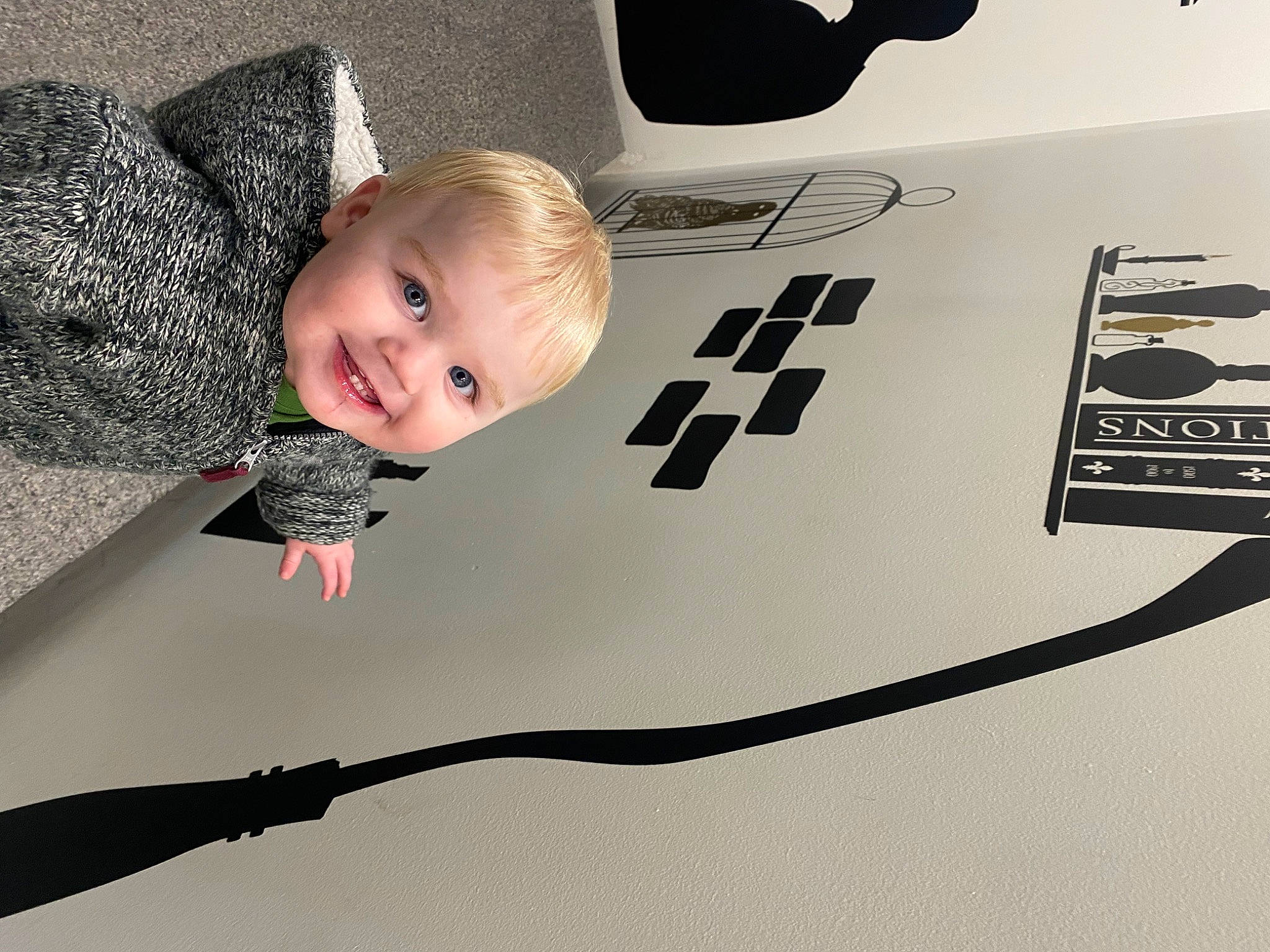 Niklaus joined the competition — help win amazing prizes! art, baby, baby_toddler_clothing, child, comfort, flooring, font, fun, gadget, happy, joy, linens, office_equipment, output_device, pattern, person, room, sleeve, smile, t_shirt