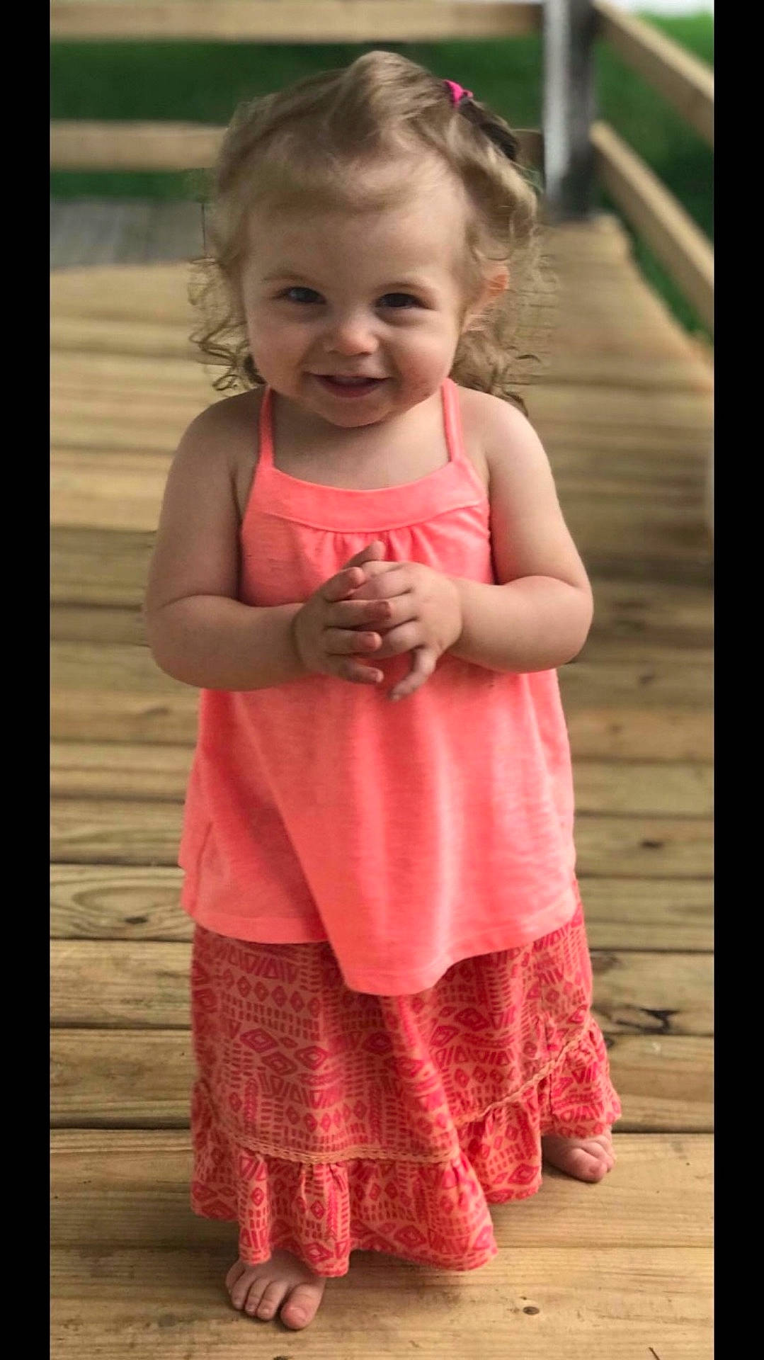 Raelynne is registered to the contest to win money with this photo: child, daughter, day, dress, fun, girl, infant, joy, magenta, person, pink, skin, smile, standing, textile, toddler