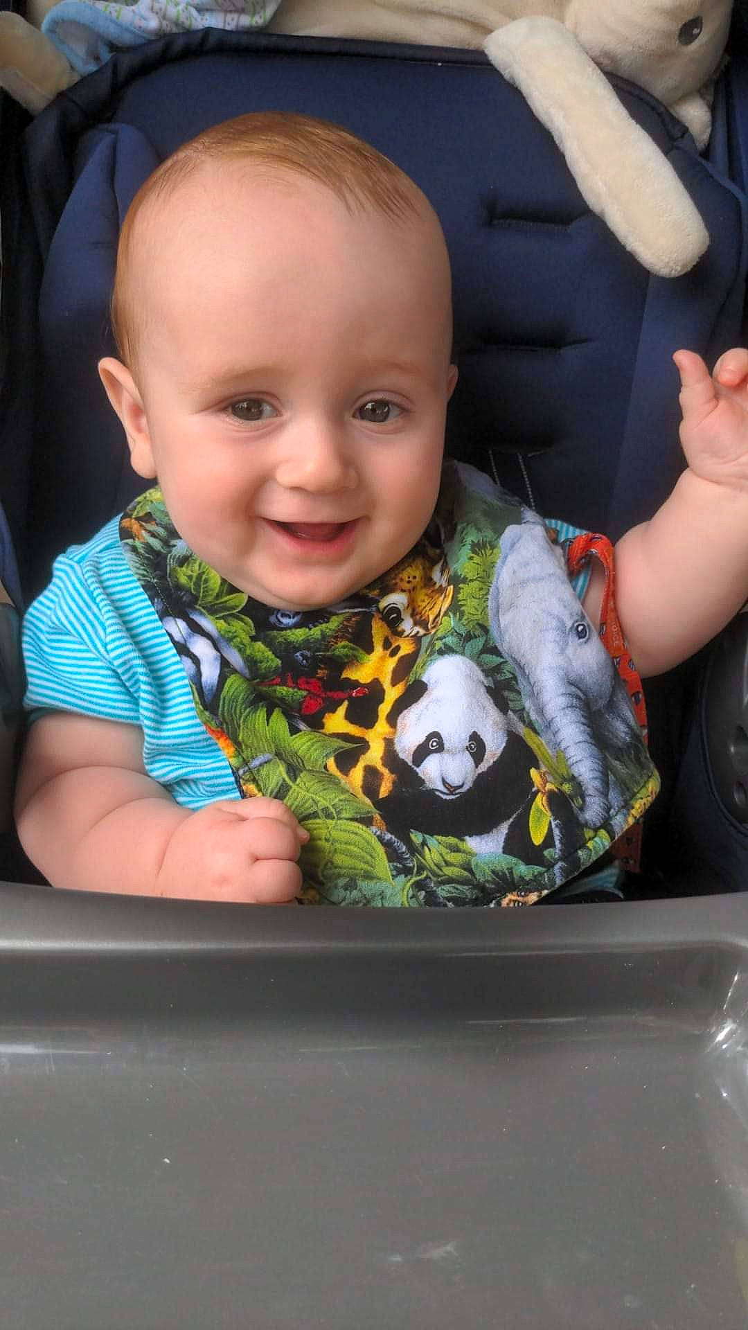 Ivan joined the competition — help win amazing prizes! auto_part, baby, baby_in_car_seat, baby_products, baby_toddler_clothing, cheek, child, finger, fun, hand, happy, iris, joy, mouth, person, product, sitting, skin, smile, t_shirt
