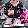 Arya joined the competition — help win amazing prizes! asphalt, black_jacket, car, child, clapping, clothing, daytime, happy, market_basket, outdoor, pajamas, parking_lot, person, retail, shopping_cart, smiling, store, toddler, urban, vehicle