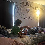 Luna joined the competition — help win amazing prizes! child, bedroom, bed, blanket, curtain, wall_art, lamp, window, person, smile, room, toy, shirt, door, pillow, hair, furniture, indoor, relax, play