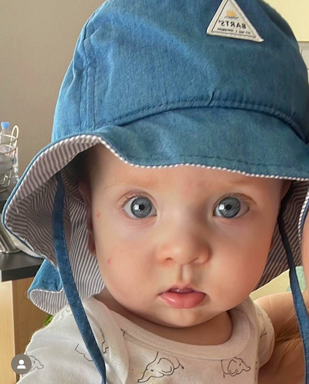 Adaan participe au concours pour gagner de l'argent avec cette photo : cap, cheek, chin, eye, eyelash, facial_expression, hat, head, headwear, human, iris, lip, nose, organ, outerwear, person, photograph, skin, sleeve, sun_hat