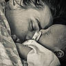 Azrael joined the competition — help win amazing prizes! baby, adult, sleeping, close_up, black_and_white, pacifier, blanket, face, love, tenderness, cozy, intimacy, portrait, peaceful, skin, head, family, rest, comfort, cuddle