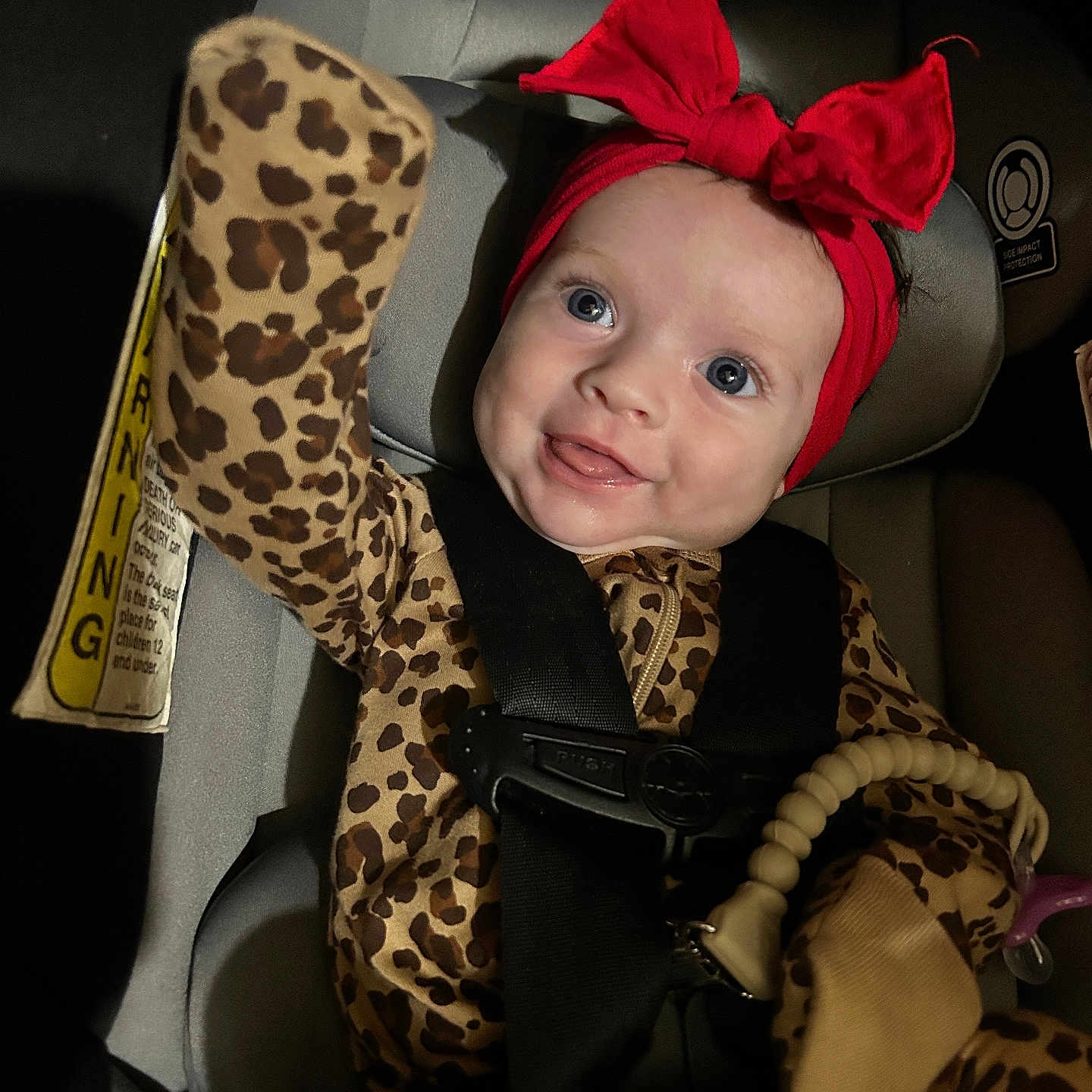 Josephine is registered to the contest to win money with this photo: accessories, baby, bodypart, car, car_interior, clothing, cushion, face, finger, formalwear, hand, hat, head, homedecor, person, photography, portrait, tie, transportation, vehicle