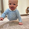 Reuben is registered to the contest to win money with this photo: baby, child, infant, crawling, smiling, happy, blue_outfit, collar, portrait, face, indoor, carpet, floor, dog, pet, home, close_up, photography, cute, curious
