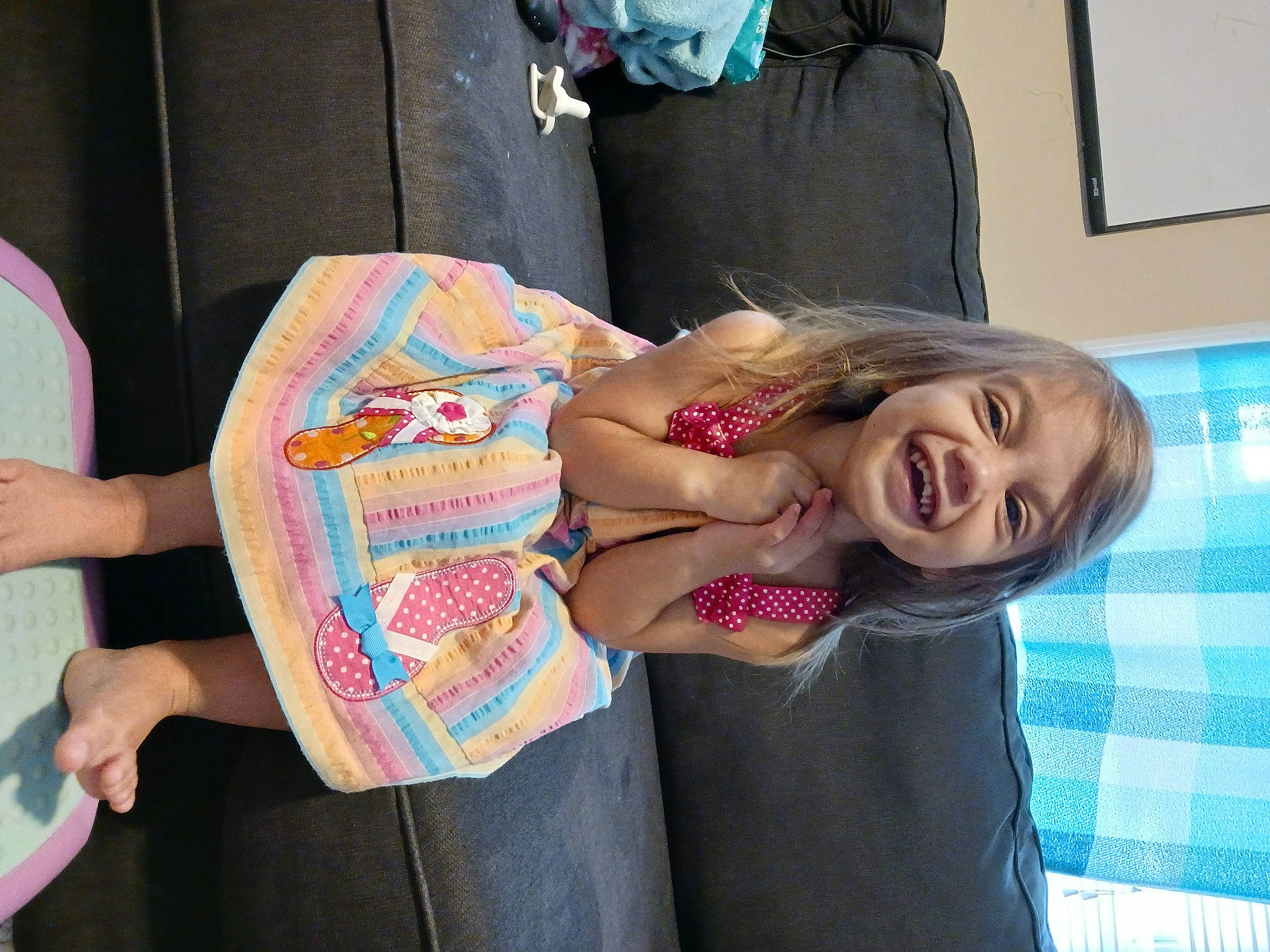 Ivy joined the competition — help win amazing prizes! chest, child, comfort, elbow, finger, fun, gesture, happy, human_leg, joint, joy, nail, pattern, person, picture_frame, room, smile, t_shirt, thigh, thumb