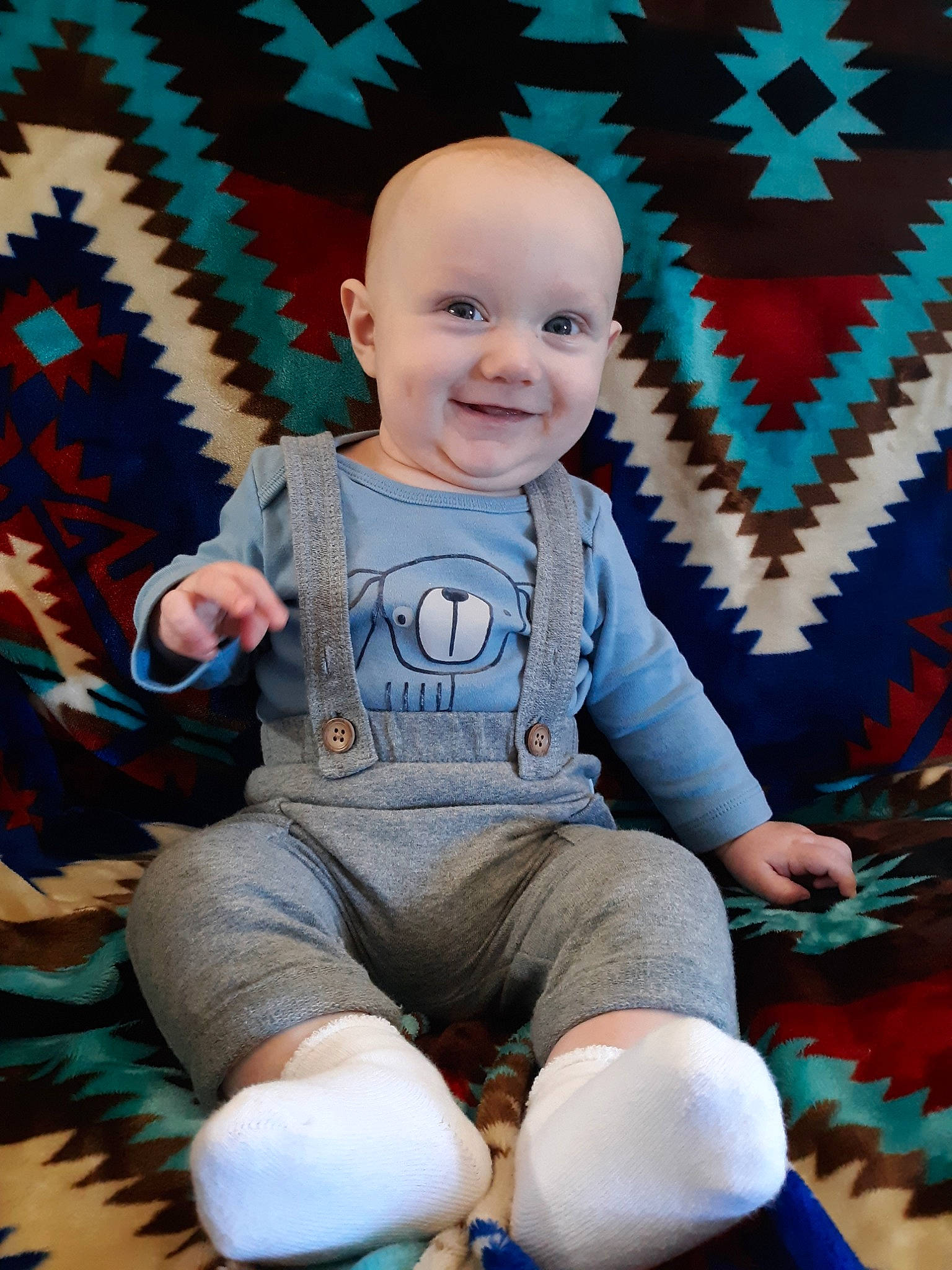 Henry is registered to the contest to win money with this photo: baby, child, joy, person, sitting, smile, toddler