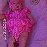 baby, infant, pink_clothing, headband, blanket, wooden_plaque, three_months, date_stamp, lying_down, milestone, cute, soft_texture, indoors, portrait, child, newborn, person, legs, feet, face