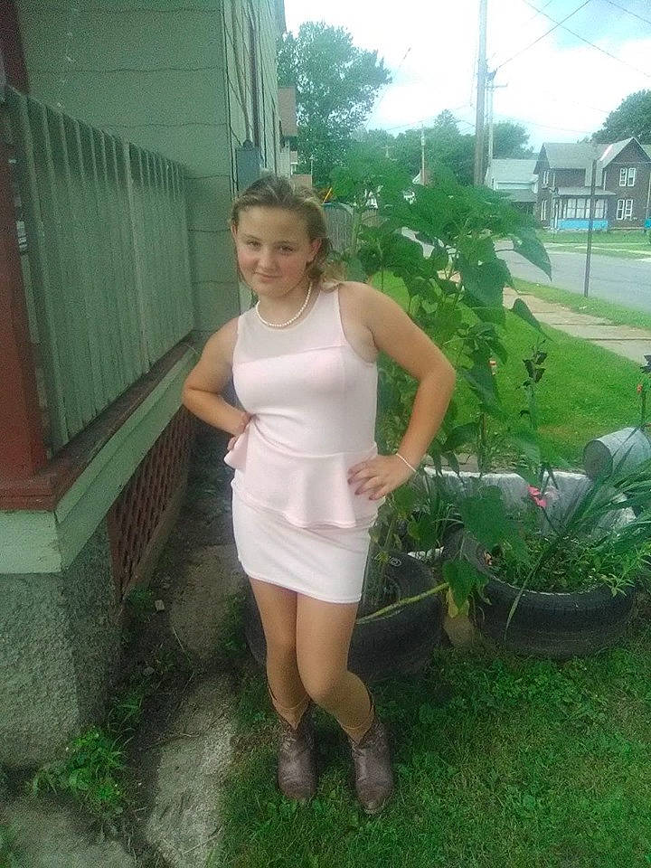 Elvira is registered to the contest to win money with this photo: dress, fawn, grass, joint, joy, knee, leg, person, thigh