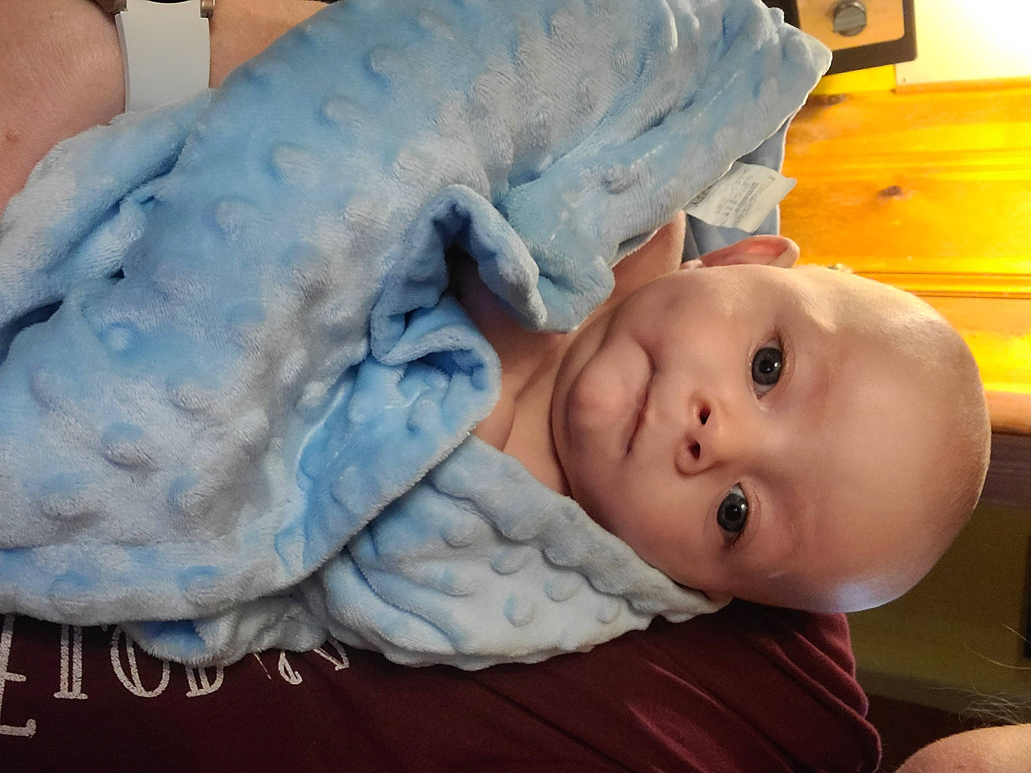 Joseph joined the competition — help win amazing prizes! baby, baby_products, baby_safety, baby_sleeping, baby_toddler_clothing, cheek, child, comfort, eye, fur, iris, linens, mouth, pattern, person, room, sitting, skin, toddler, wood