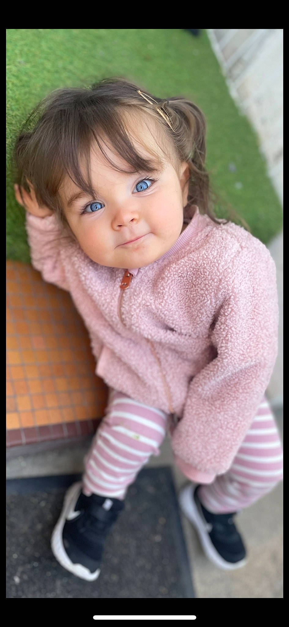 Emy participe au concours pour gagner de l'argent avec cette photo : arm, baby, baby_toddler_clothing, beauty, cheek, child, cool, grass, happy, iris, lip, nose, organ, outerwear, pattern, person, pink, product, skin, sleeve