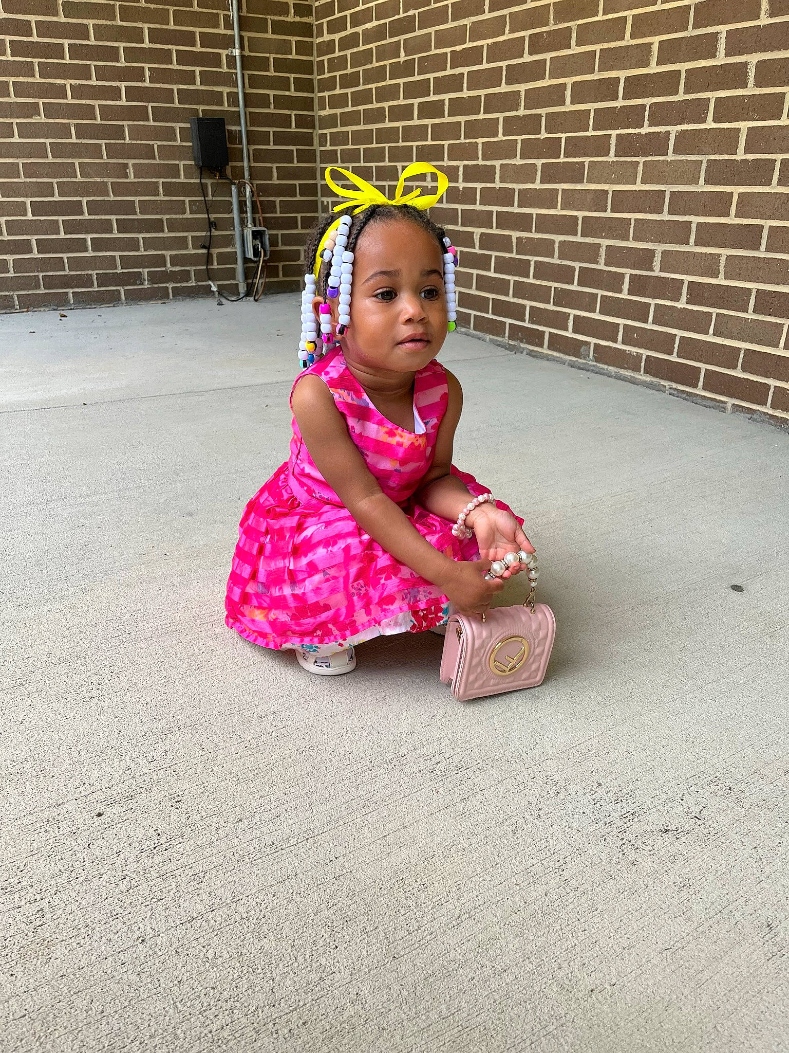Brazil joined the competition — help win amazing prizes! asphalt, baby, baby_toddler_clothing, brickwork, child, dress, floor, flooring, fun, grass, happy, magenta, pattern, person, pink, road_surface, sandal, sitting, sleeve, tints_and_shades