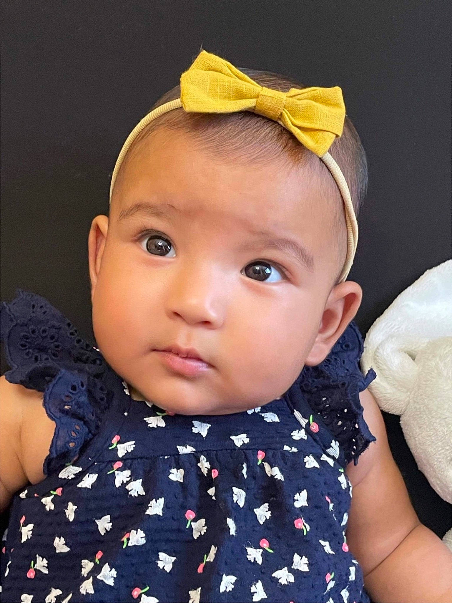 Ariana participe au concours pour gagner de l'argent avec cette photo : baby_toddler_clothing, cheek, chin, collar, costume_hat, ear, eye, eyebrow, eyelash, hair, hairstyle, happy, iris, lip, neck, nose, person, pink, skin, sleeve