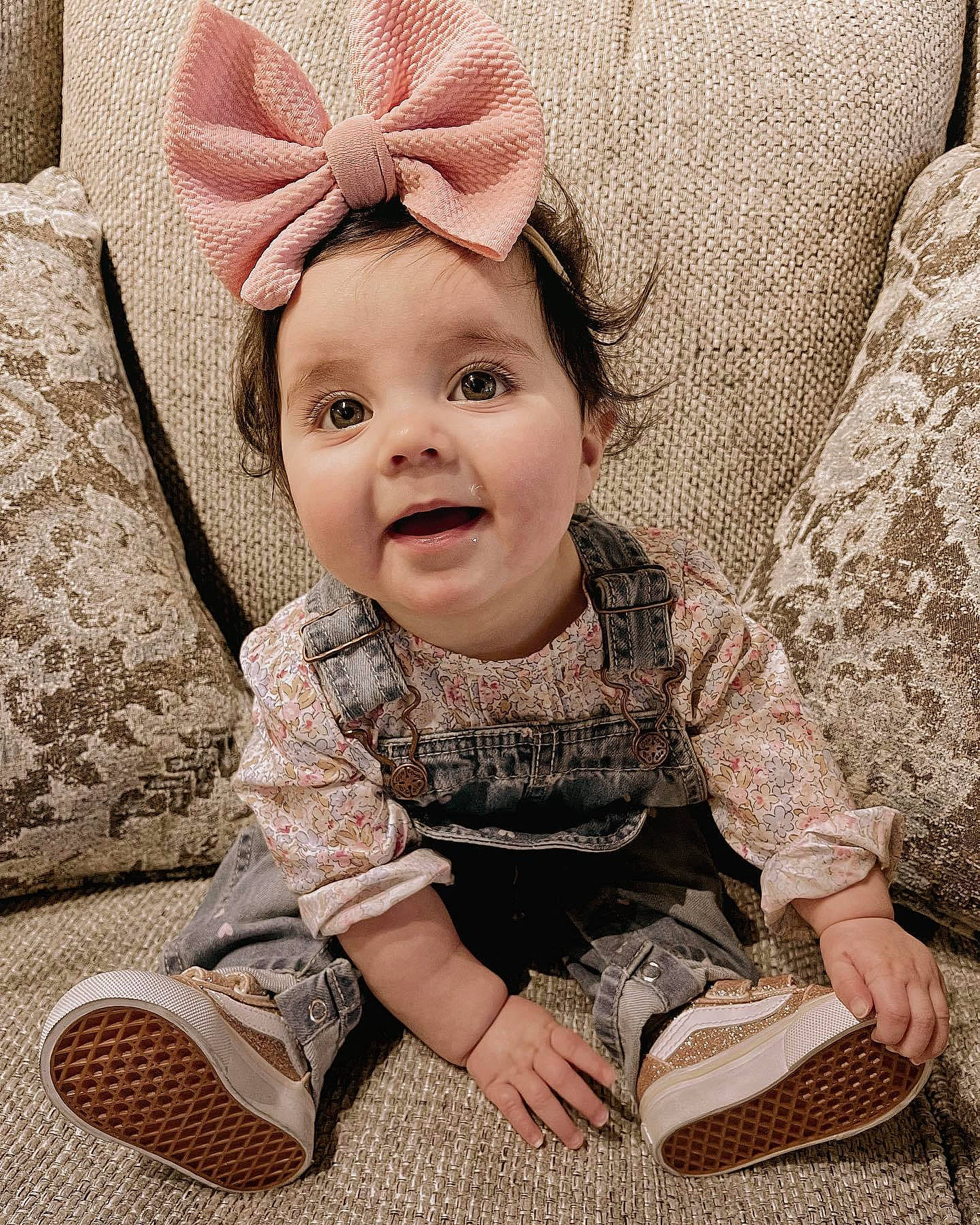 Sophia is registered to the contest to win money with this photo: baby, baby_toddler_clothing, child, comfort, dress, eye, face, happy, head, iris, pattern, person, pink, skin, sleeve, smile, sneakers, textile, toddler, vertebrate