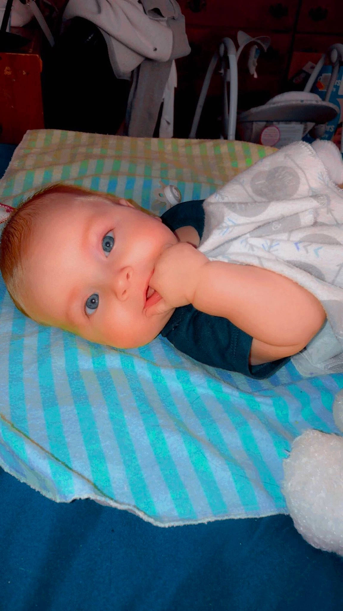 Kaiden is registered to the contest to win money with this photo: baby, baby_products, baby_toddler_clothing, chair, cheek, child, comfort, eye, fun, human_body, iris, mouth, nose, person, pink, sitting, skin, textile, toddler, toy