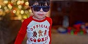 Billie joined the competition — help win amazing prizes! child, boy, sunglasses, pajamas, red_and_white, striped_pants, indoor, christmas_tree, holiday, toy, carpet, cute, smiling, standing, young_child, face, hair, clothing, home, festive