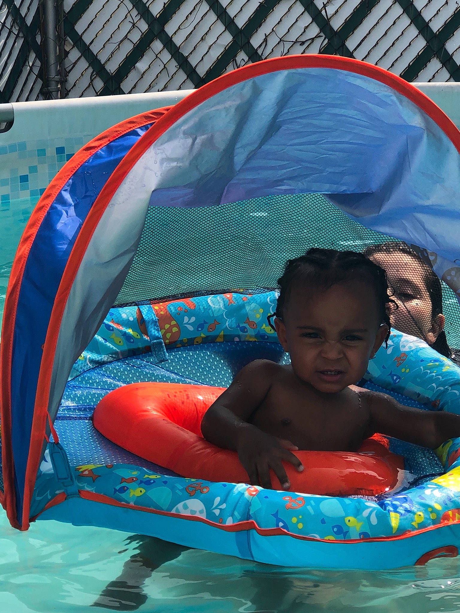 Kamron is registered to the contest to win money with this photo: anger, baby_float, baby_products, child, fun, games, inflatable, leisure, person, play, product, recreation, sorrow, swimming_pool, toy, vacation