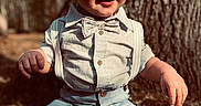 Arnold joined the competition — help win amazing prizes! toddler, child, boy, outdoor, tree, nature, sunlight, bow_tie, suspenders, shirt, pants, smile, happy, portrait, baby, face, hands, fashion, casual, sitting