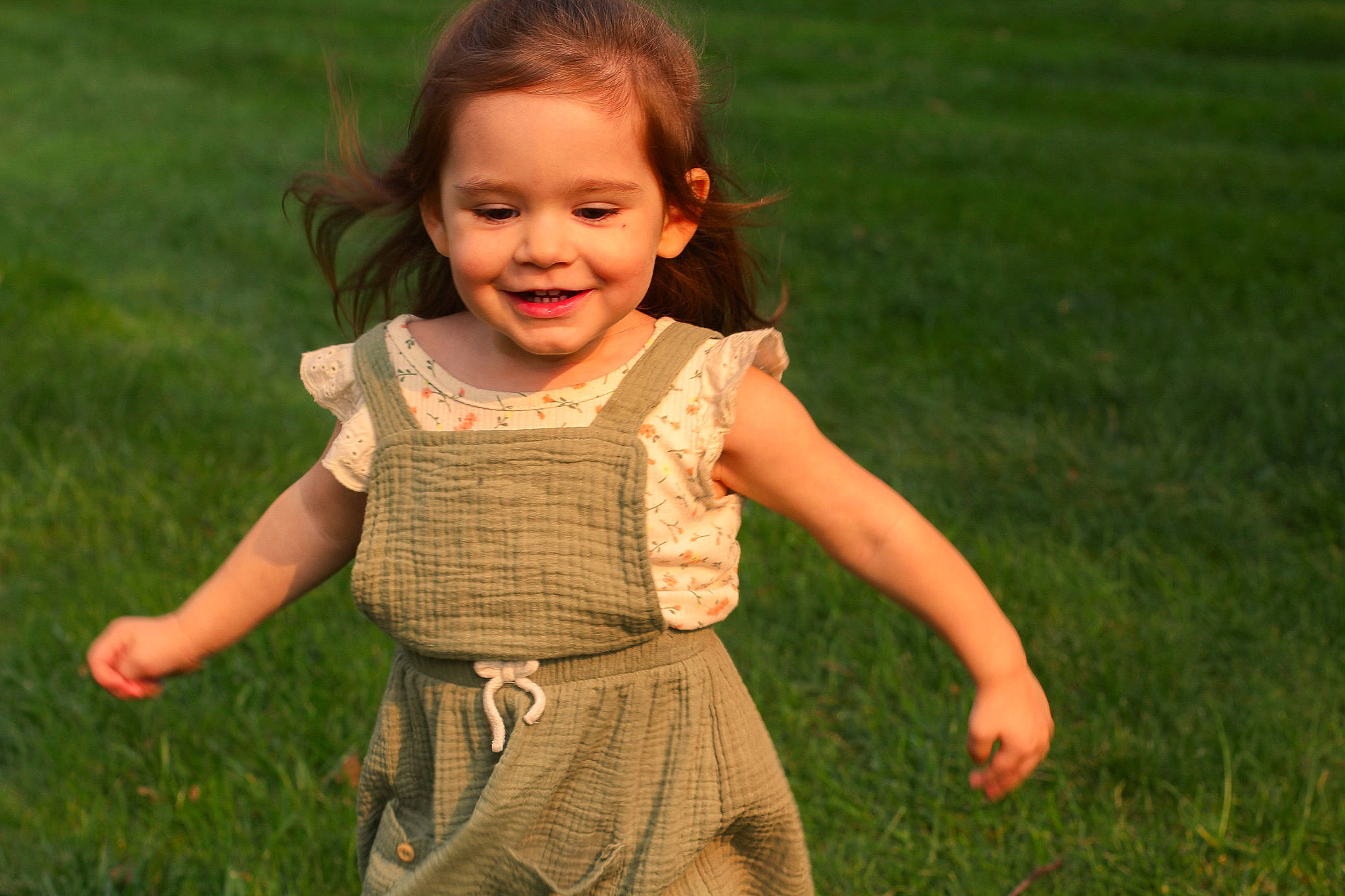Sydney joined the competition — help win amazing prizes! baby, child, dress, facial_expression, finger, fun, gesture, grass, grass_family, green, hand, happy, joy, meadow, people_in_nature, person, photography, plant, skin, smile