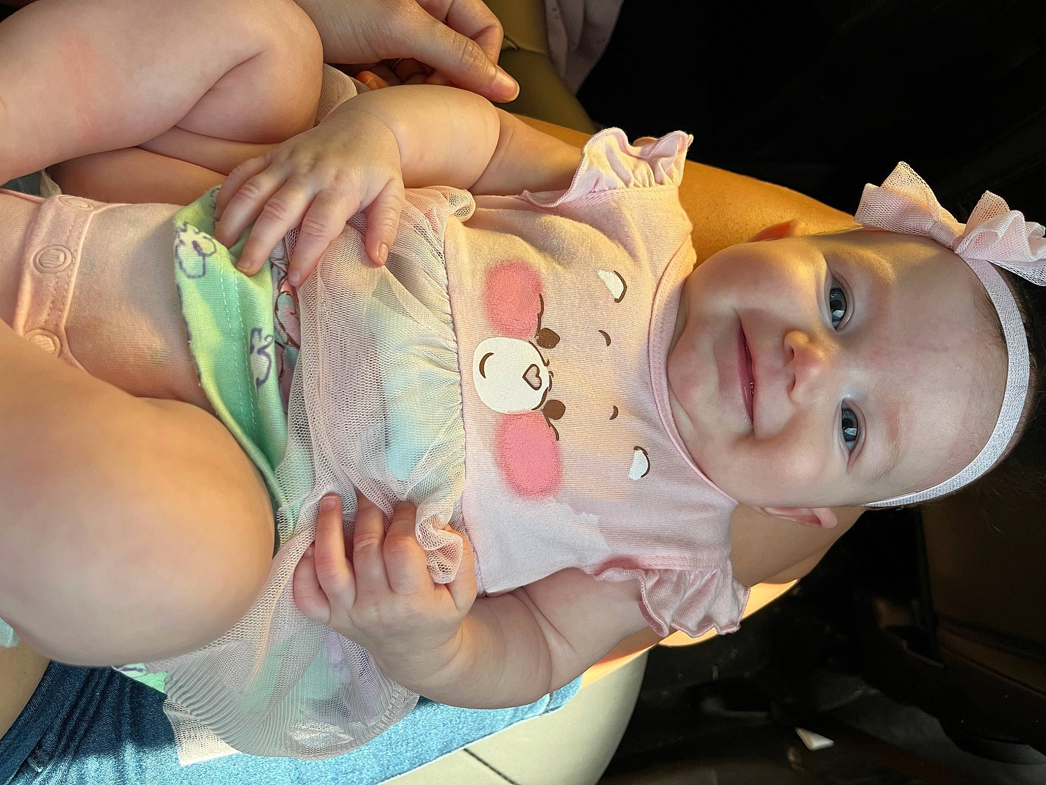 Bella is registered to the contest to win money with this photo: arm, baby, baby_toddler_clothing, cheek, chest, child, eyelash, finger, gesture, hand, happy, hat, joy, mouth, nail, person, skin, smile, thumb, toddler