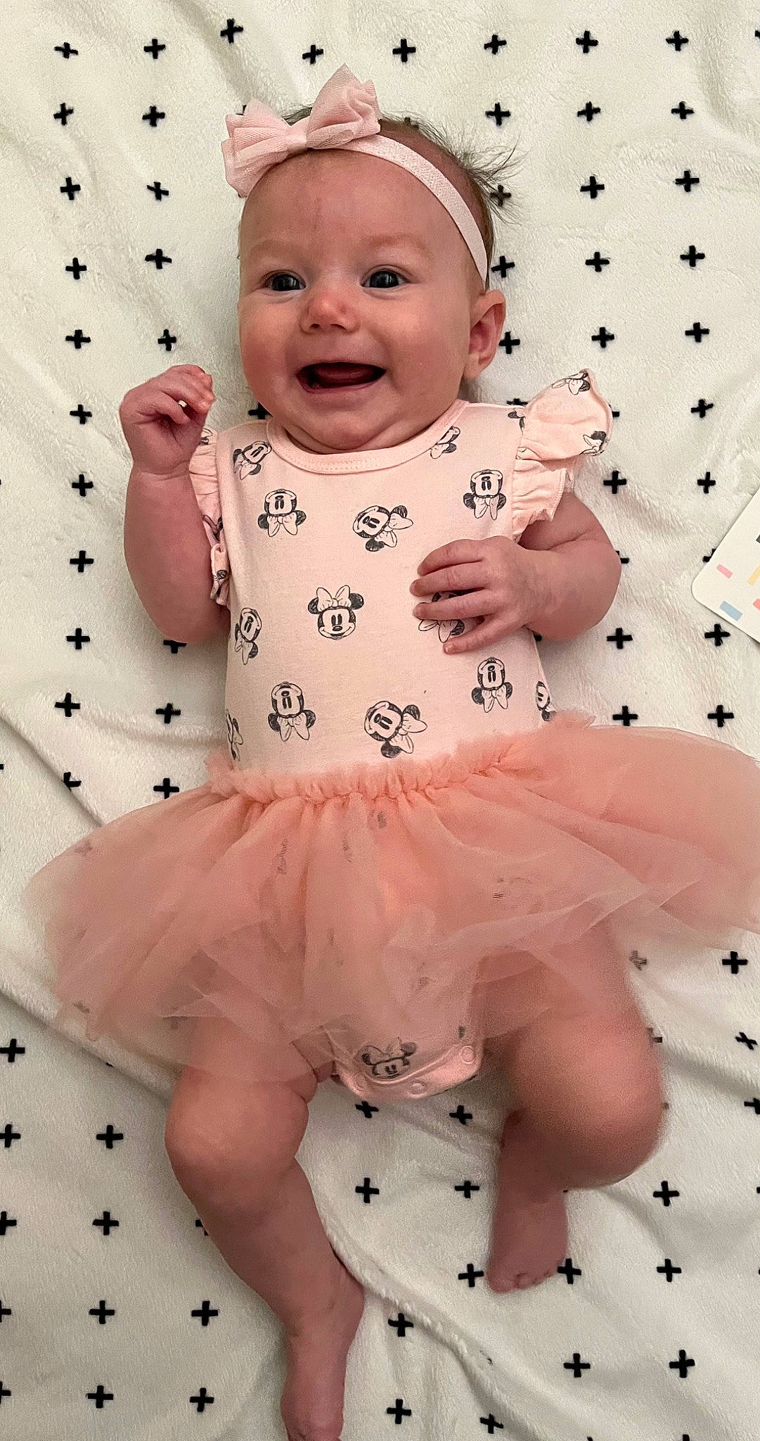 Bella joined the competition — help win amazing prizes! baby, baby_products, baby_toddler_clothing, cap, cheek, child, clothing, face, finger, happy, pattern, person, pink, product, sitting, skin, sleeve, smile, thigh, toddler