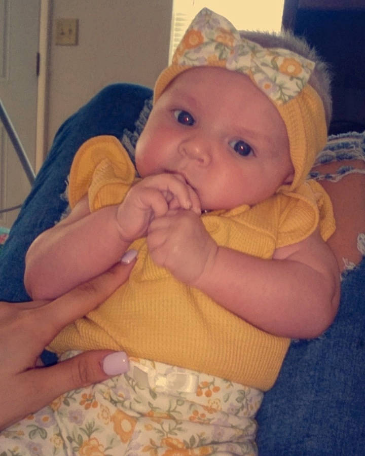 Octavia joined the competition — help win amazing prizes! baby, baby_products, baby_toddler_clothing, cap, cheek, comfort, ear, finger, gesture, happy, headgear, headwear, human_body, iris, lip, mouth, nose, person, sitting, skin