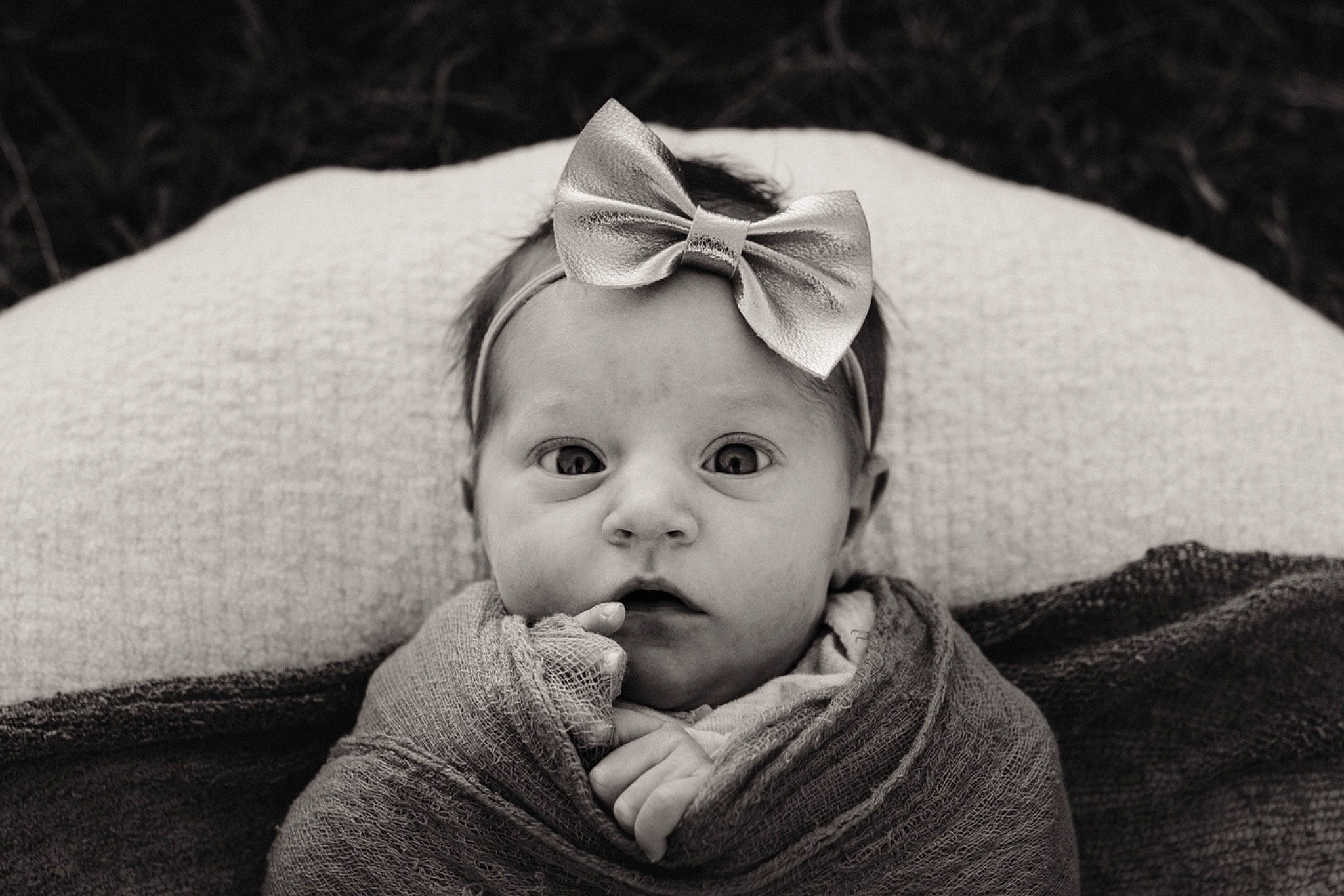 Celeste is registered to the contest to win money with this photo: baby, baby_toddler_clothing, cheek, comfort, face, flash_photography, grass, grey, happy, headgear, iris, monochrome, monochrome_photography, nose, outerwear, person, skin, sleeve, textile, toddler