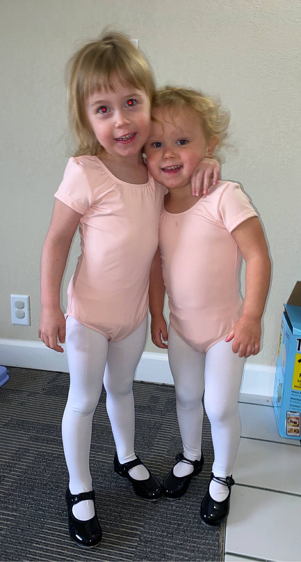 Lainey is registered to the contest to win money with this photo: abdomen, baby_toddler_clothing, cheek, chest, eye, face, gesture, happy, head, human_leg, iris, joy, knee, person, sleeve, smile, standing, thigh, thumb, toddler