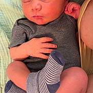 Lynnwood joined the competition — help win amazing prizes! newborn, baby, sleeping, infant, person, child, clothing, sock, striped_sock, hand, legs, diaper, closeup, cute, resting, cozy, blanket, arm, skin, toddler