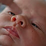 baby, newborn, close_up, face, skin, nose, lips, finger, infant, child, portrait, soft_light, delicate, human, cute, expression, detail, small, young, innocent