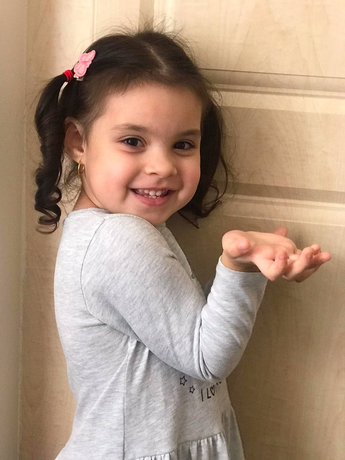 Fatima is registered to the contest to win money with this photo: arm, cheek, elbow, eyebrow, eyelash, flash_photography, gesture, hairstyle, happy, iris, joy, lip, neck, nose, organ, people, person, skin, sleeve, smile