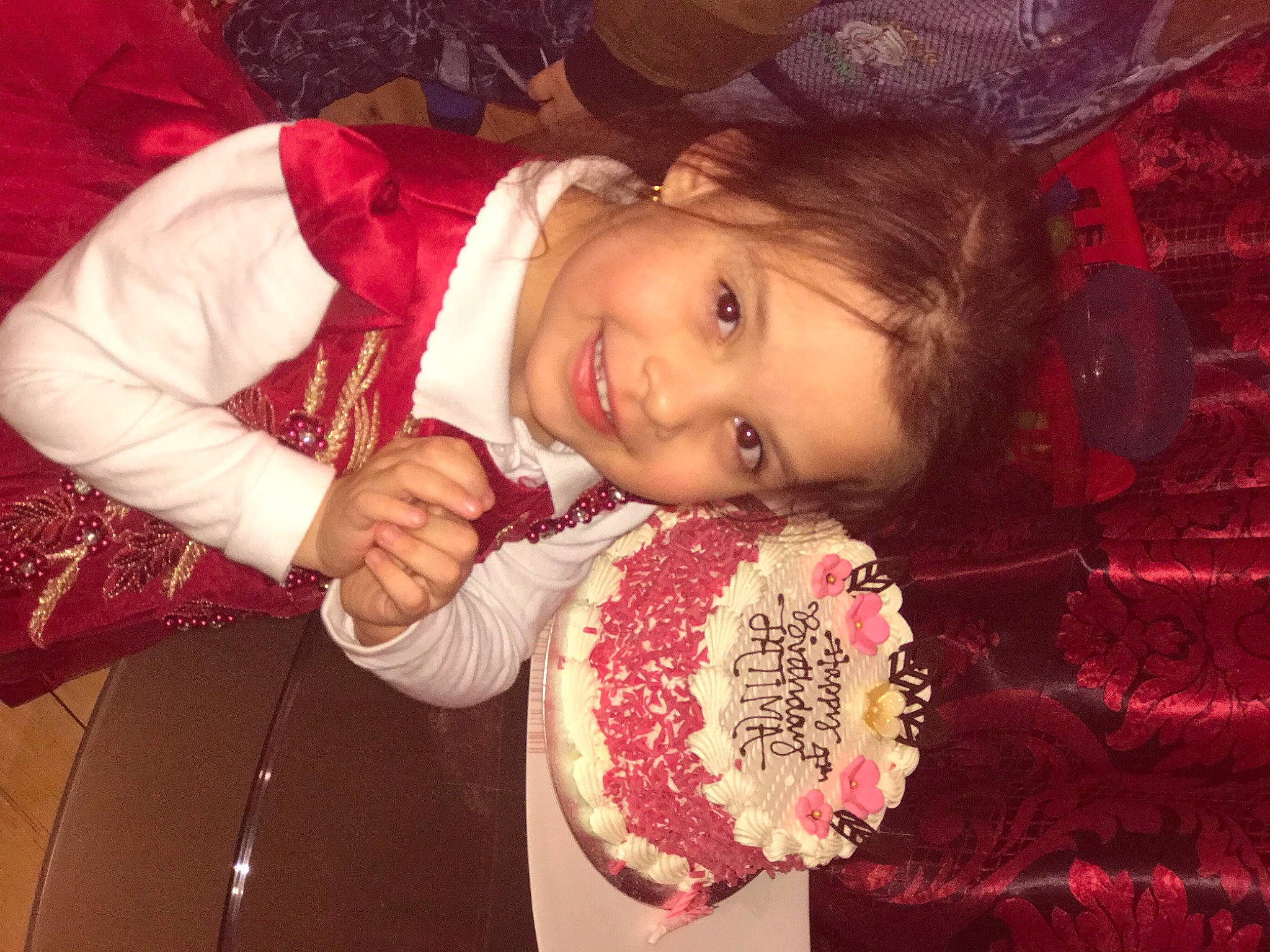 Fatima is registered to the contest to win money with this photo: cheek, chin, christmas, event, eye, facial_expression, happy, head, holiday, joy, lip, mouth, nose, person, pink, skin, sleeve, smile, textile, toddler