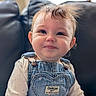 Juniper joined the competition — help win amazing prizes! baby, child, infant, denim_overalls, heart_patch, cute, smiling, face, blue_eyes, long_sleeve_shirt, indoor, couch, leather_couch, window, natural_light, portrait, toddler, clothing, happy, sitting