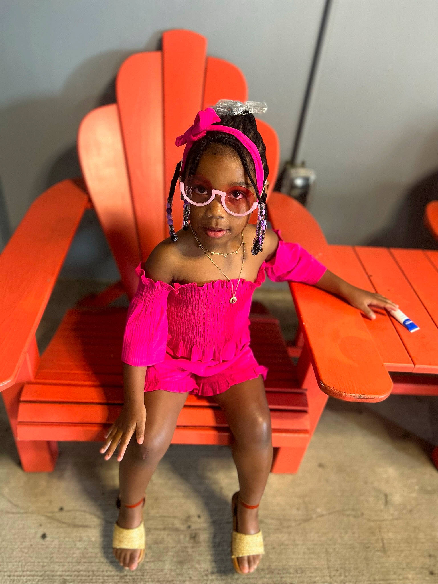 Nina is registered to the contest to win money with this photo: entertainment, eyewear, fashion_design, flash_photography, fun, glasses, glove, goggles, hat, leg, leisure, magenta, person, pink, sandal, shoe, shorts, sneakers, sunglasses, thigh