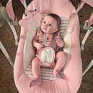Fayth joined the competition — help win amazing prizes! baby, infant, child, pink_bouncer, baby_seat, sitting, lying_down, wide_eyes, face, portrait, indoor, carpet, plush_toys, toy, harness, pink_clothing, patterned_fabric, playtime, home, adorable