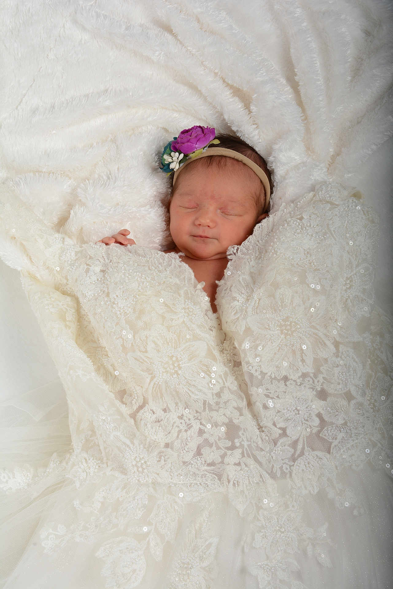 Maelyn joined the competition — help win amazing prizes! newborn, baby, sleeping, headband, flower, lace, blanket, white, soft, fabric, closeup, portrait, infant, peaceful, cute, wrapped, delicate, cozy, resting, tender